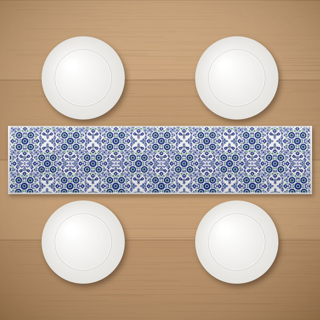 Garden table runner on a wooden table with plates