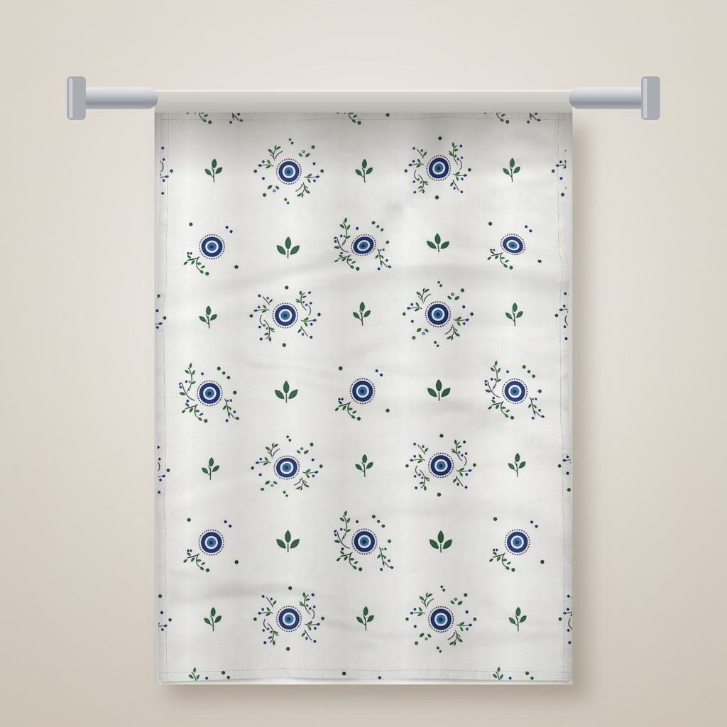 Meadow tea towel hanging on a rail