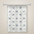 Meadow tea towel hanging on a rail