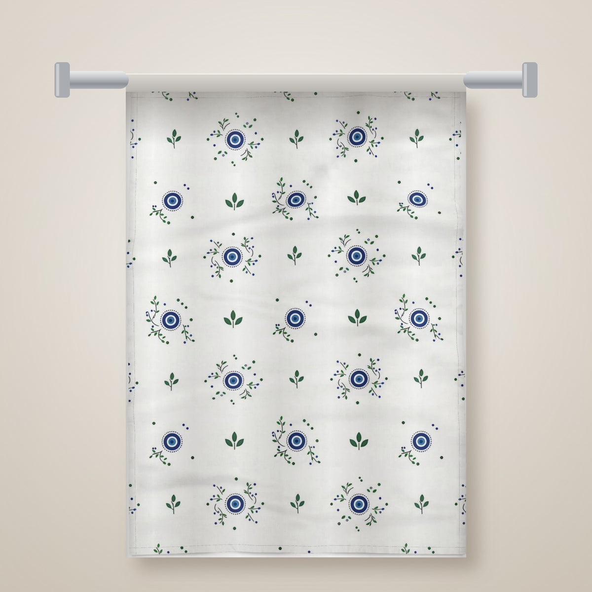 Meadow tea towel hanging on a rail